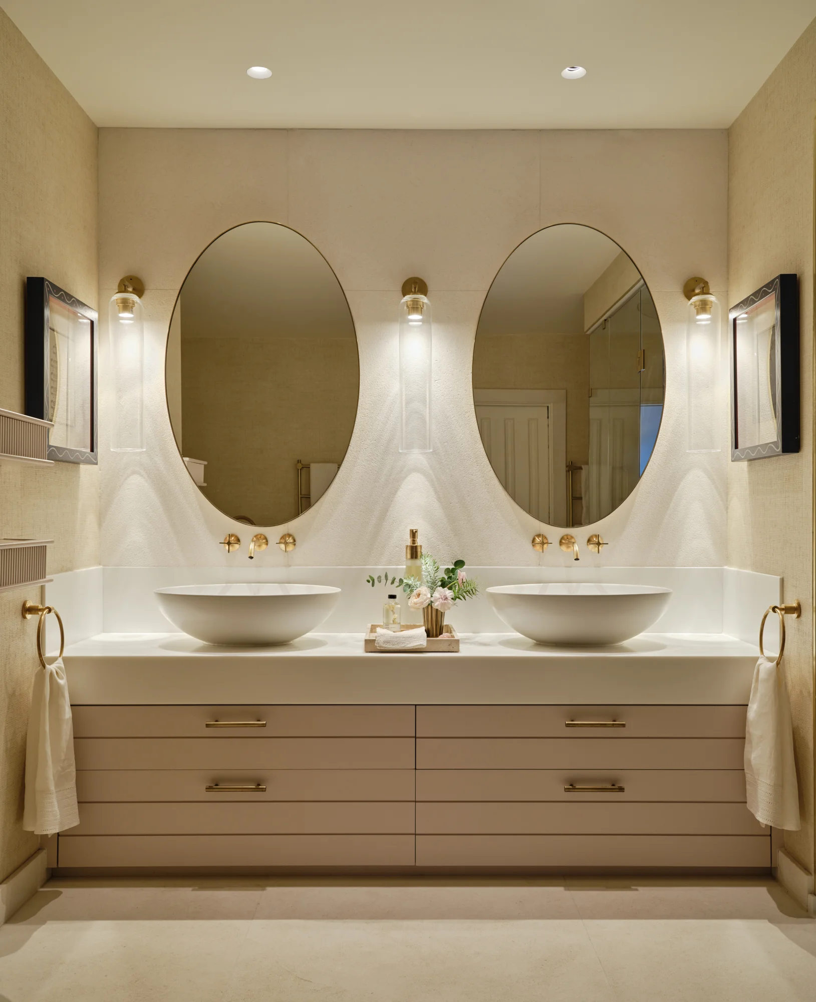 Master bathroom suite with grass cloth wallcovering and stone floor with bespoke joinery and solid brass fittings throughout
